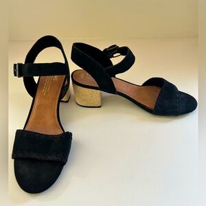 Never worn outside Tom’s size 9.5